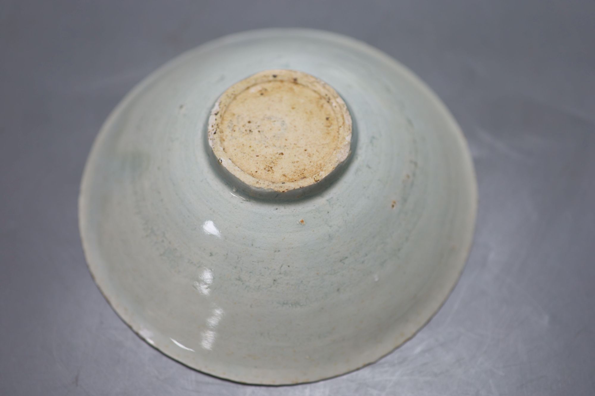 An 18th century Chinese famille rose tea bowl, together with a Qingbai type bowl and dish, largest diameter 17cm